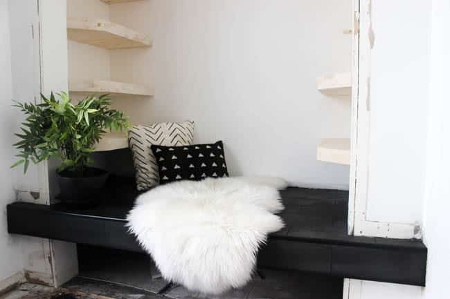 Gorgeous Tiled Entry Bench! Love the use of tile on this creative DIY project! The basalt tile looks amazing on this tiled bench seat. Great modern design for a tiled entryway!