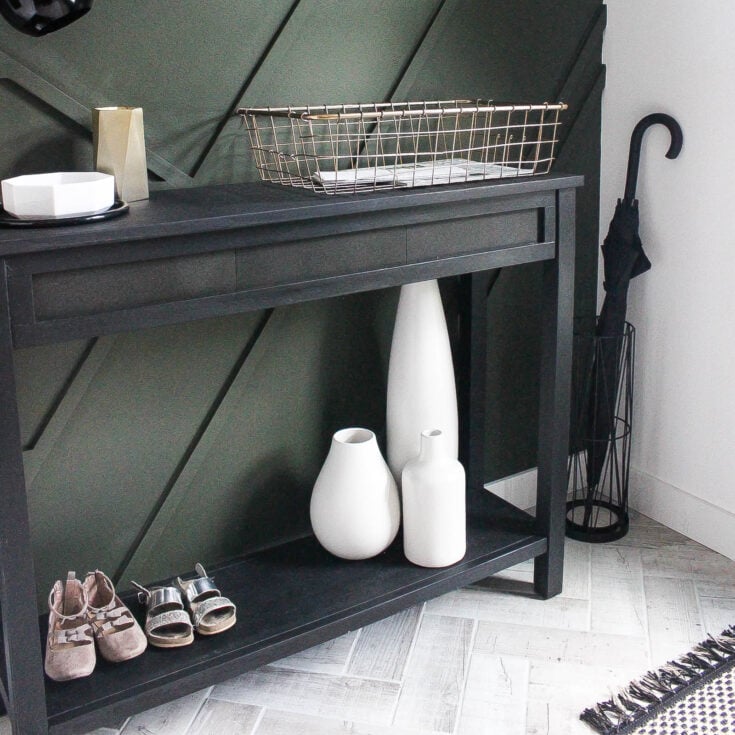 Beautiful Furniture Transformation! Use leftover tile to upcycle an old console table into a beautiful, modern piece in just a few steps. Beautiful narrow table for the entry or hallway. Such a wonderful use of leftover tile!