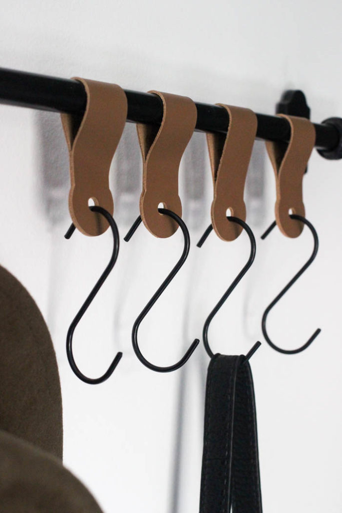 Gorgeous! Make your own modern entry wall hooks with this simple tutorial! Learn how to cut leather on the Cricut machine and make beautiful entryway home decor! LOVE this DIY leather idea!