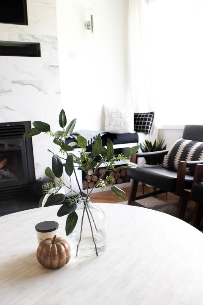 A beautiful cozy fall home tour! Love the pops of mustard yellow in this monochromatic modern fall living room! Beautiful minimalistic way to style a living room for autumn! 