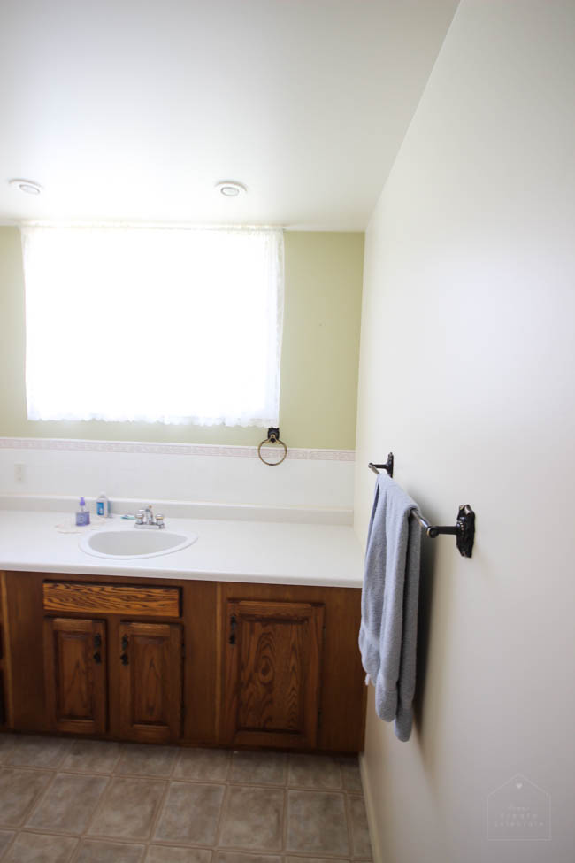 Exploring new bathroom layout options for a rectangular outdated bathroom. Things to consider before starting a bathroom remodel!