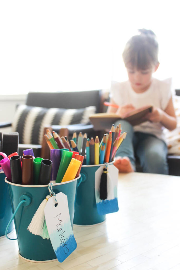 Don't like your handwriting?? Use the Cricut to write all of your tags, gift cards, envelopes! Great tutorial for showing you how to use the Cricut writing pens on materials you already have. LOVE this simple way to organize school supplies at home! The ombre tags are so cute! 