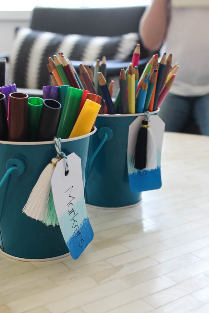 Don't like your handwriting?? Use the Cricut to write all of your tags, gift cards, envelopes! Great tutorial for showing you how to use the Cricut writing pens on materials you already have. LOVE this simple way to organize school supplies at home! The ombre tags are so cute!