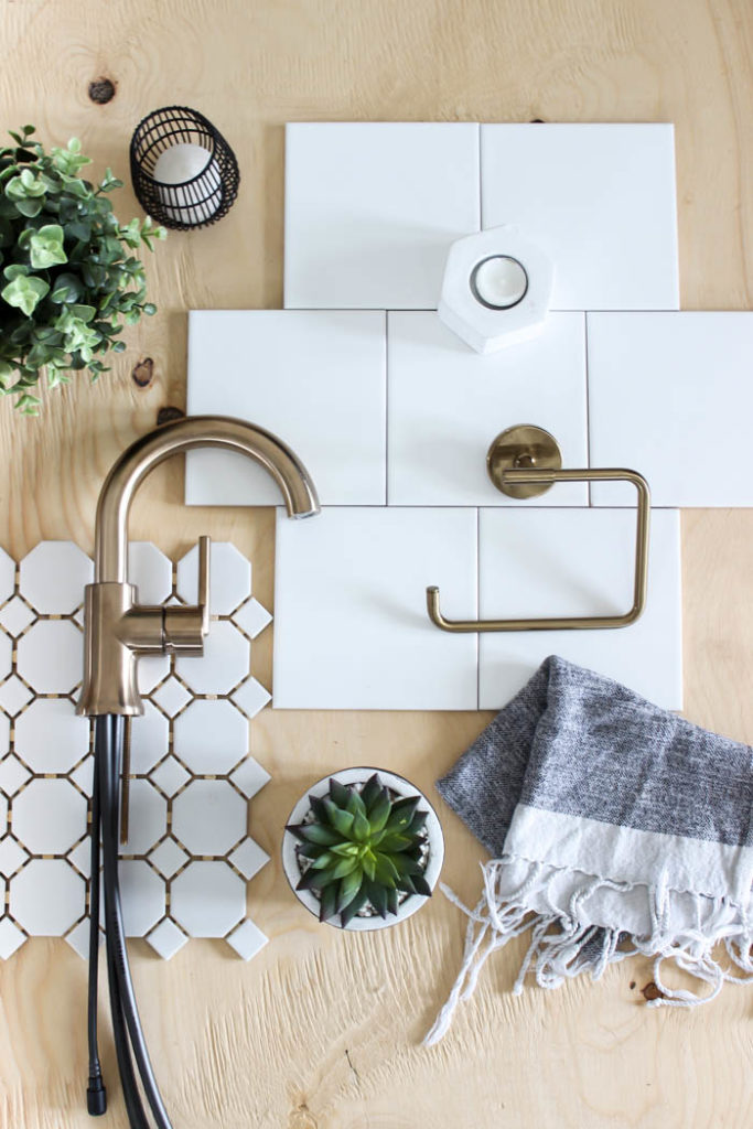 Ideas for choosing a modern faucet, tub filler, and shower head for your bathroom! Love the champagne bronze finish for this contemporary space! #bathroom #modernbathroom #homedesign #flaylay 