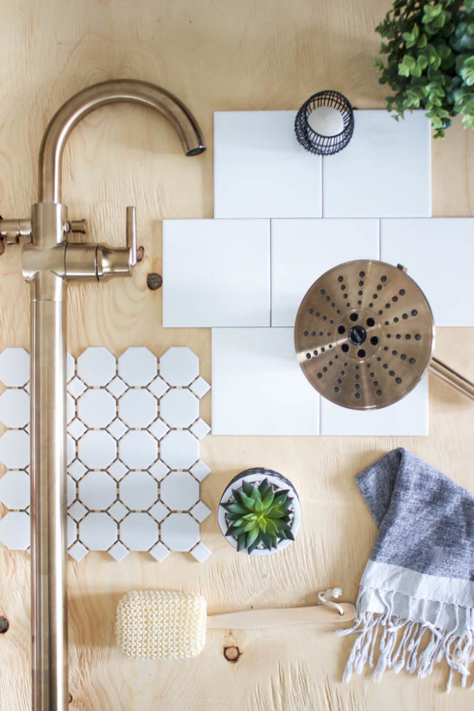 Ideas for choosing a modern faucet, tub filler, and shower head for your bathroom! Love the champagne bronze finish for this contemporary space! #bathroom #modernbathroom #homedesign #flaylay 