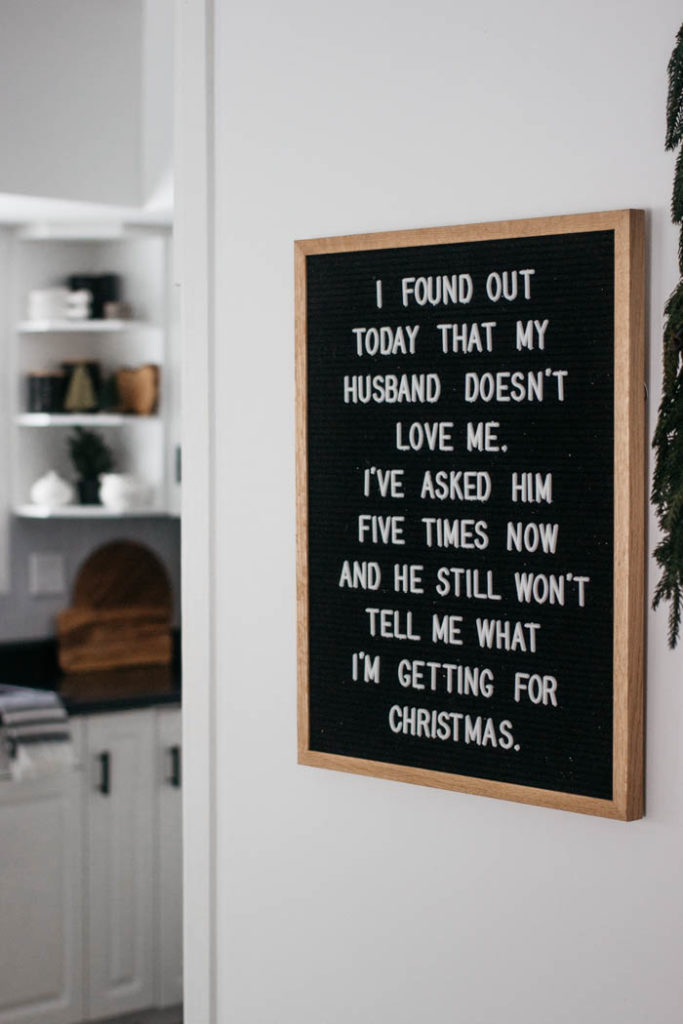 A Modern Minimalist Christmas Kitchen and Dining Room! LOVE the subtle touches of Christmas and the beautiful decor in these two rooms. A beautiful mix of natural colours in the green, black, and white colour palette. Touches of nordic and scandi style in this minimalistic holiday design. #nordic #modern #Christmas #Christmasdecor #ChristmasKitchen #blackandwhite 