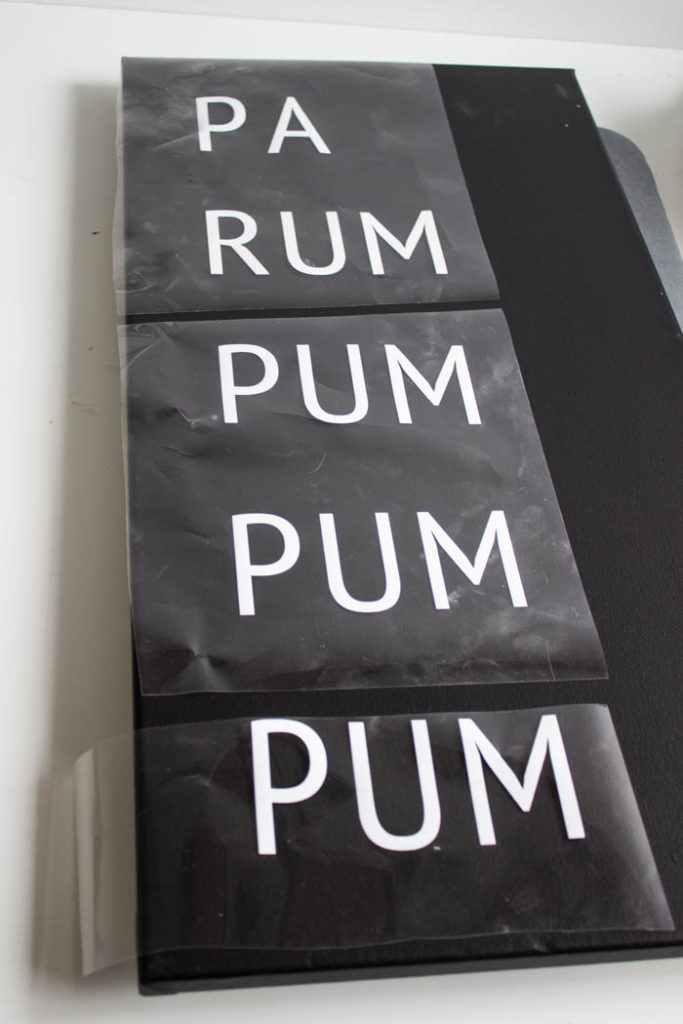 A beautiful Modern DIY sign for the holiday season! Love this simple Pa Rum Pum Pum Pum Christmas sign! What a fun way to share the song lyrics and decorate your home. #Christmas #holidaysign #DIYart #ModernChristmas #blackandwhite #homedecor