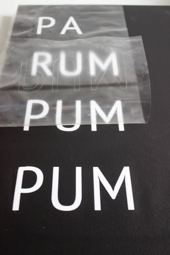 A beautiful Modern DIY sign for the holiday season! Love this simple Pa Rum Pum Pum Pum Christmas sign! What a fun way to share the song lyrics and decorate your home. #Christmas #holidaysign #DIYart #ModernChristmas #blackandwhite #homedecor