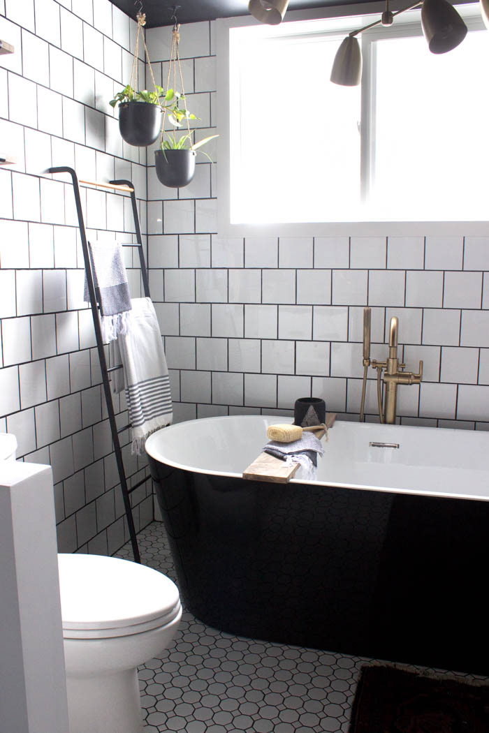 Tub in the modern bathroom reveal.