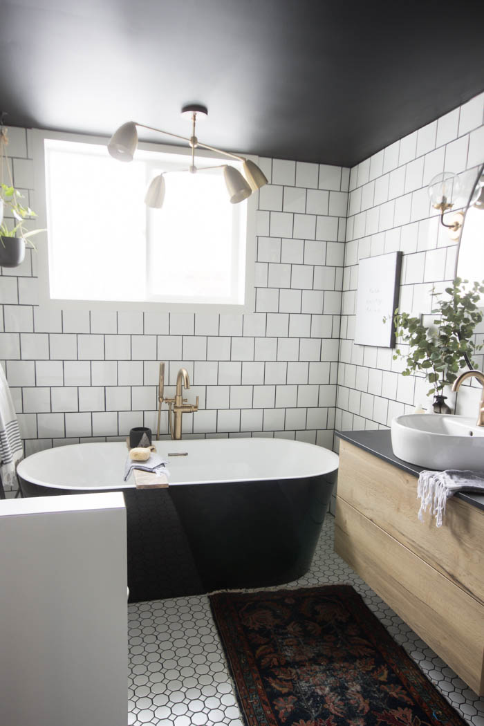 Vanity and tub in the modern bathroom reveal.