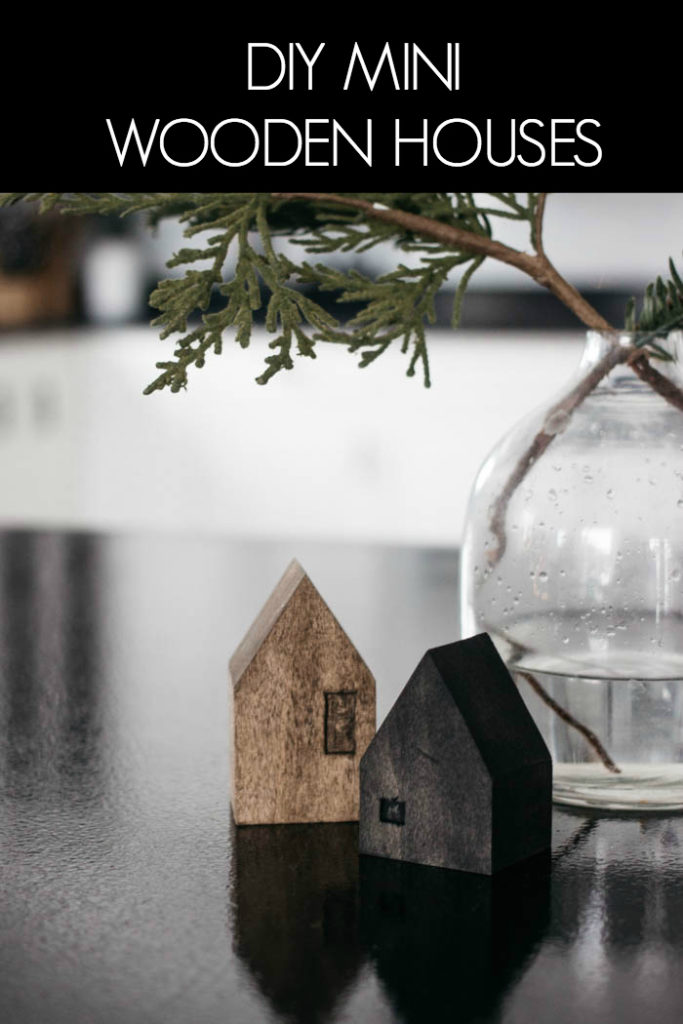 These DIY Mini Wooden Houses are adorable! Love the simple & modern design. The dark stains are beautiful. It's the perfect addition to any coffee table or shelf styling! A great scrap wood project! #scrapwood #winterdecor #holiday #minihouse #woodworking