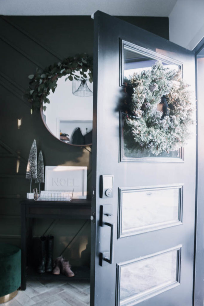 Update your front door with a keyless door lock. These amazing smart locks can be controlled with an app and linked to your Google Home device. Love the matte black lock and hardware on this black door! #smarttechnology #entry #modernentry #keylessentry #hardware