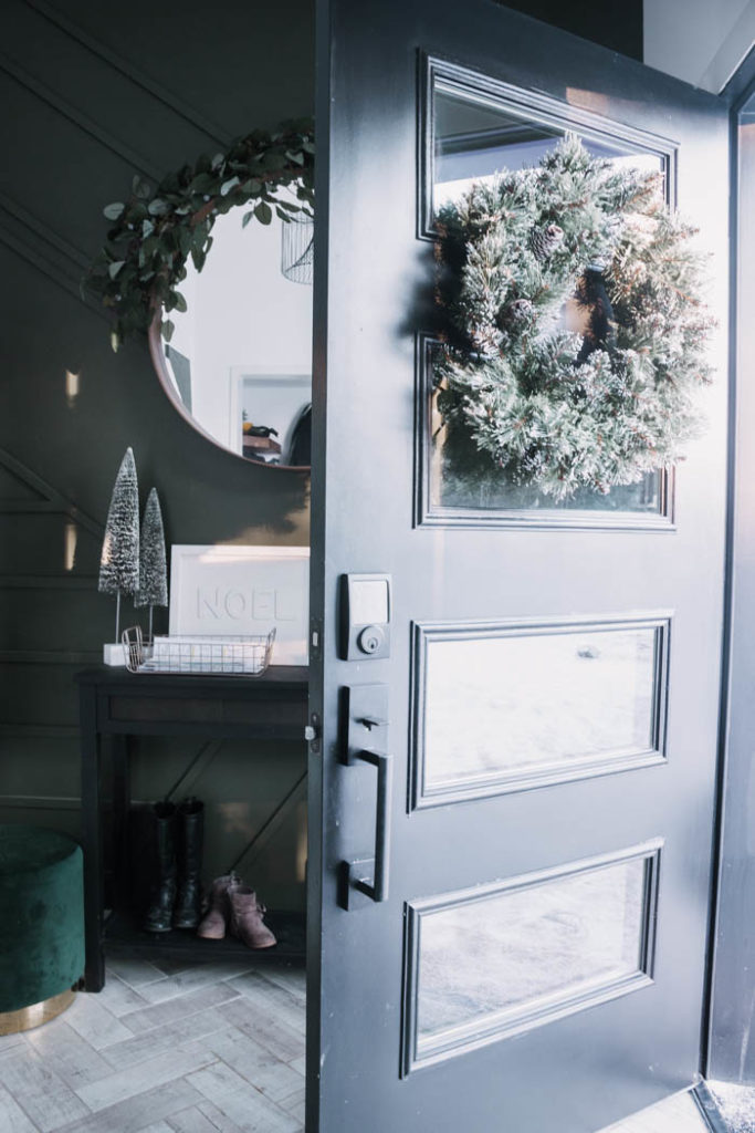 Update your front door with a keyless door lock. These amazing smart locks can be controlled with an app and linked to your Google Home device. Love the matte black lock and hardware on this black door! #smarttechnology #entry #modernentry #keylessentry #hardware