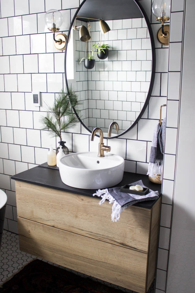 Sleek modern soap dish! Love this easy modern DIY using leftover tile! Love the chic and masculine feel to this modern DIY project on a budget. Looks amazing in this modern bathroom! #budgetfriendly #modernbathroom #basalt #leftovertile #makeover 