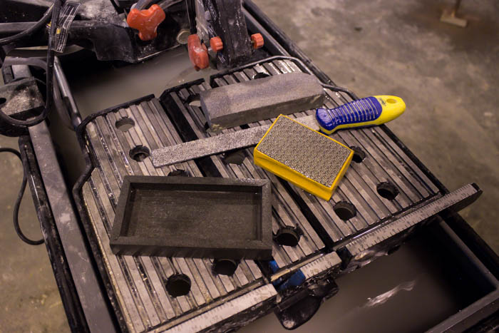 Sleek modern soap dish! Love this easy modern DIY using leftover tile! Love the chic and masculine feel to this modern DIY project on a budget. Looks amazing in this modern bathroom! #budgetfriendly #modernbathroom #basalt #leftovertile #makeover 