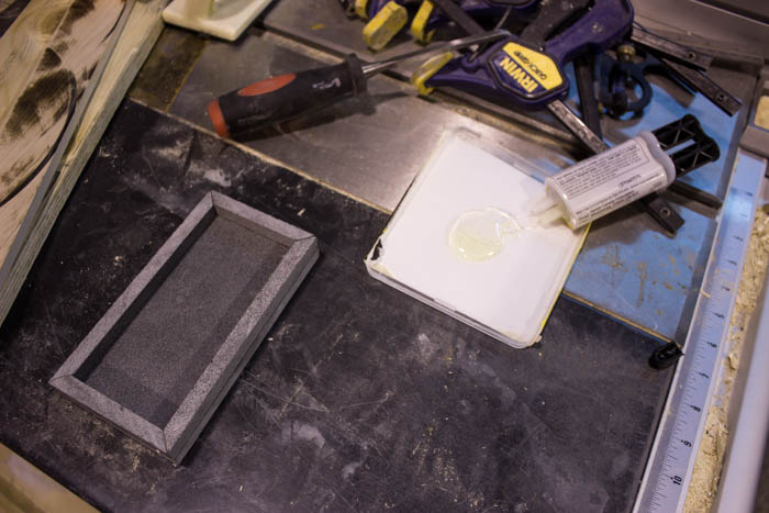 Sleek modern soap dish! Love this easy modern DIY using leftover tile! Love the chic and masculine feel to this modern DIY project on a budget. Looks amazing in this modern bathroom! #budgetfriendly #modernbathroom #basalt #leftovertile #makeover 