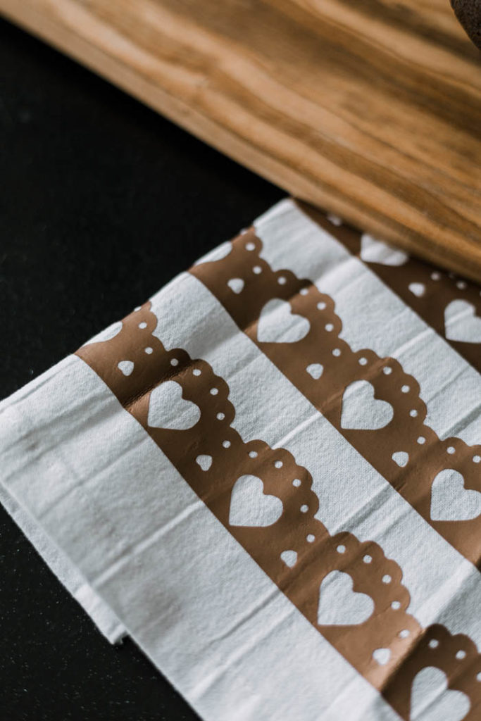 Martha Stewart projects in the design space. Easy Modern Valentine's Day Decor! Add a little love to your home with this easy DIY tea towel using the Cricut and iron-on vinyl or HTV. Love this subtle design and the modern take on Valentine's Day decor. #ValentinesDay #moderndecor #modernvalentinesday #diy #irononvinyl #cricutmade #cricutmarthastewart #cricut