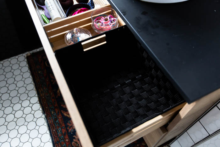 Great idea to have a basket for guests to use in the bathroom! Love these 5 great tips for organizing your drawers. So many practical and functional ideas for how to organize with just a few items. Beautiful stylish organization! #organization #bathroomorganization #modernbathroom #homeorganization