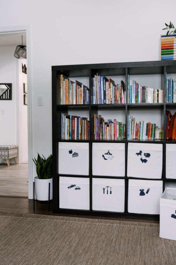 Ikea shelf and bins with vinyl labels