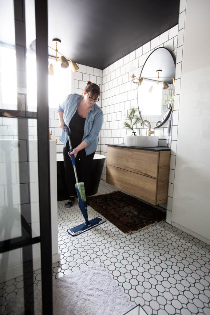 cleaning beautiful bathroom tiles