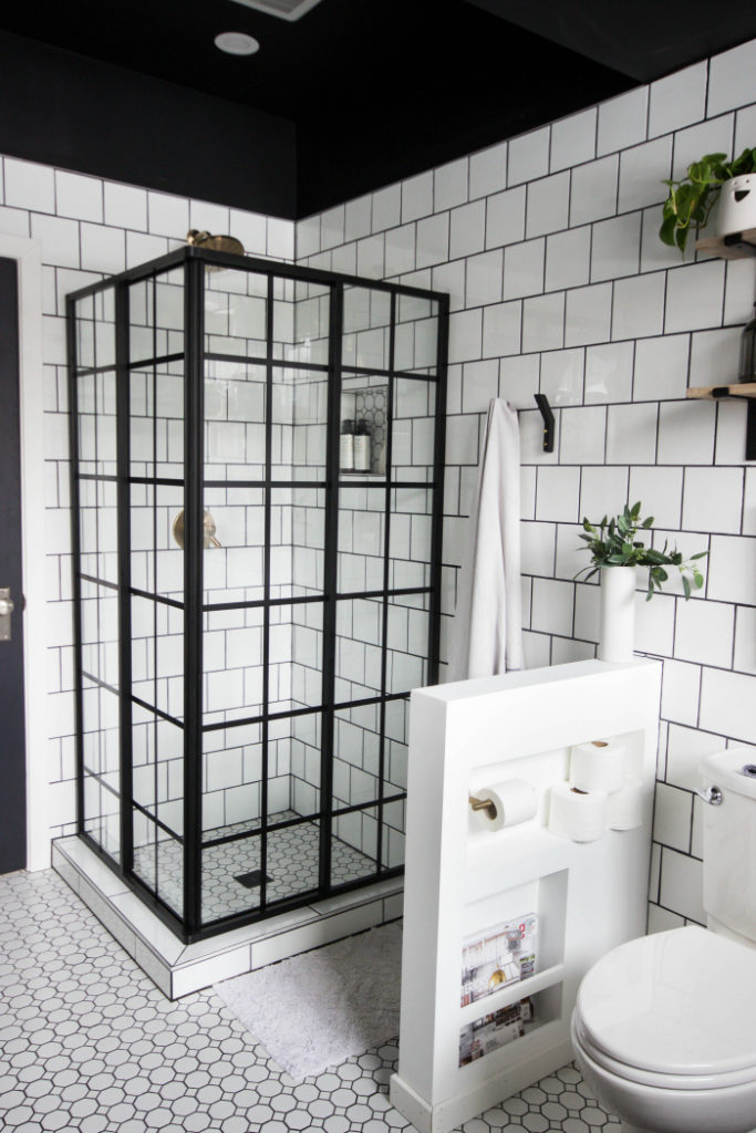 Modern bathroom featuring glass shower enclosure