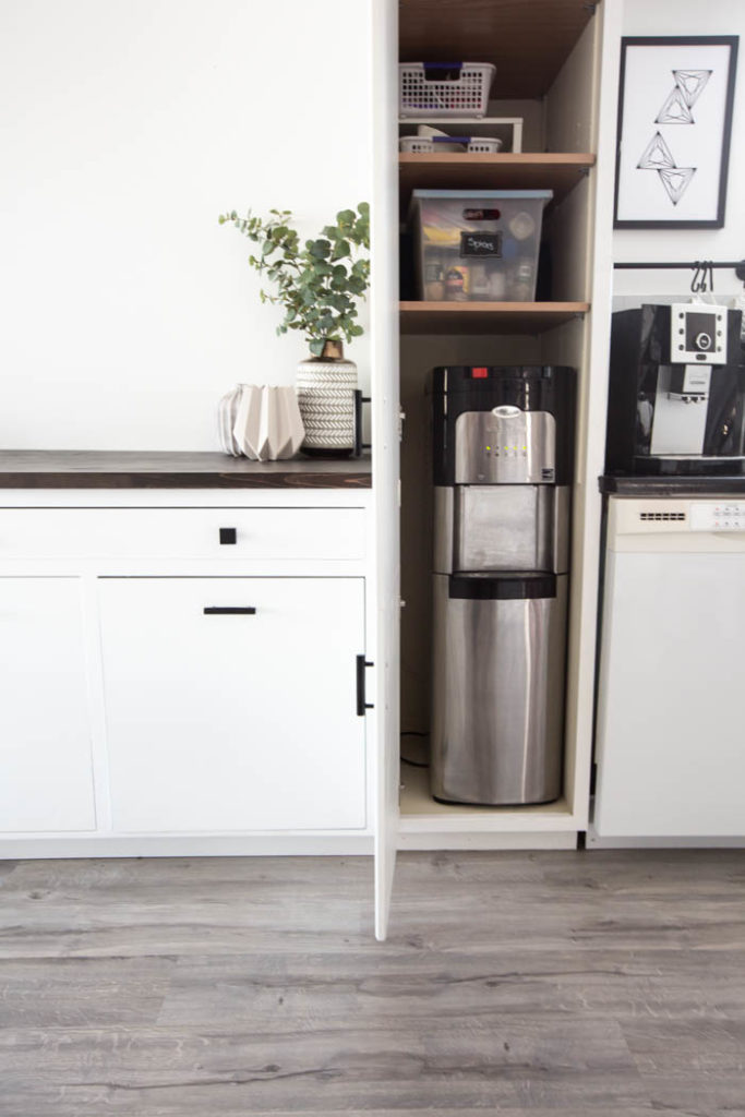 water cooler inside tall cupboard