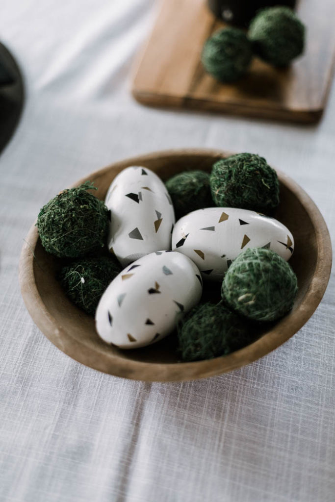 modern terrazzo easter eggs in a wooden bowl