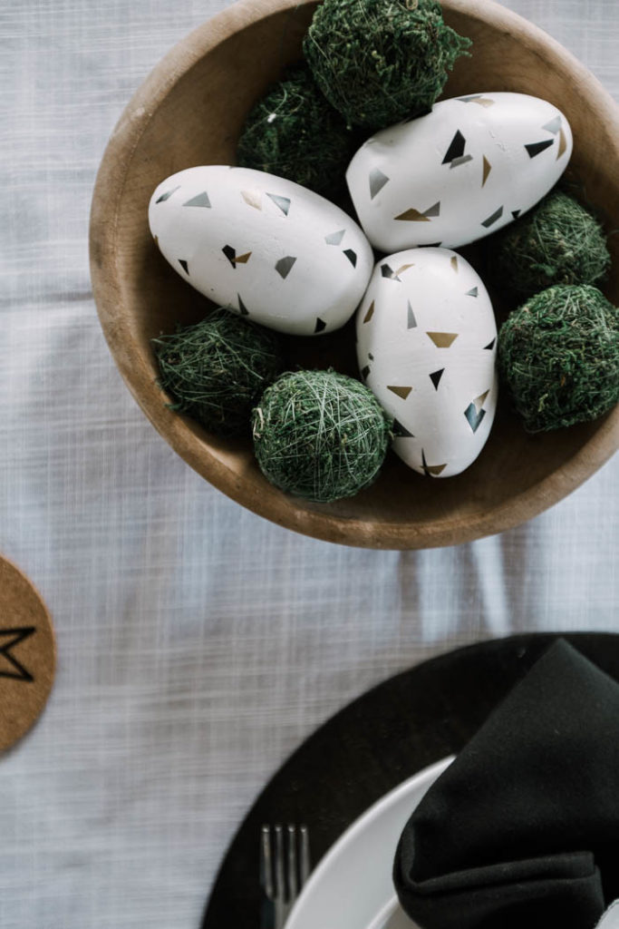easter eggs and moss in a modern easter tablescape