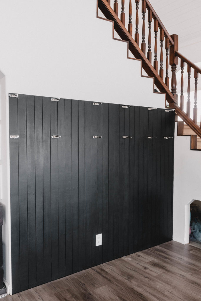 DIY black vertical shiplap wall