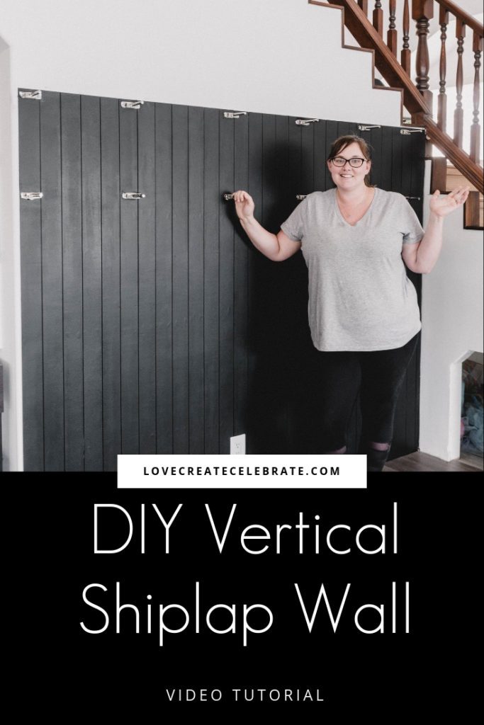 DIY modern black vertical shiplap wall with text overlay reading "DIY vertical shiplap wall lovecreatecelebrate.com"