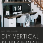Vertical shiplap wall behind a desk with text overlay reading "DIY vertical shiplap wall"