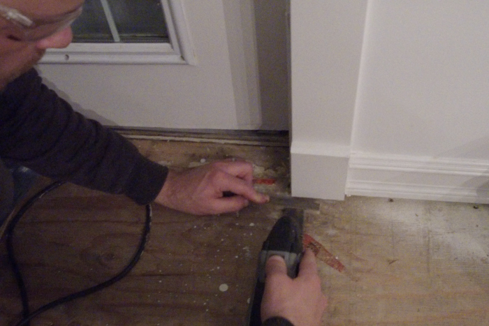 how to cut around mouldings and baseboards when laying laminate flooring