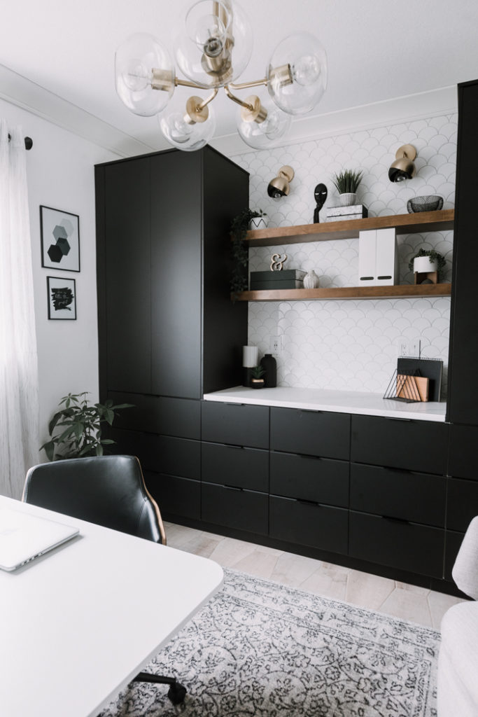 black cabinets in a stunning modern home office