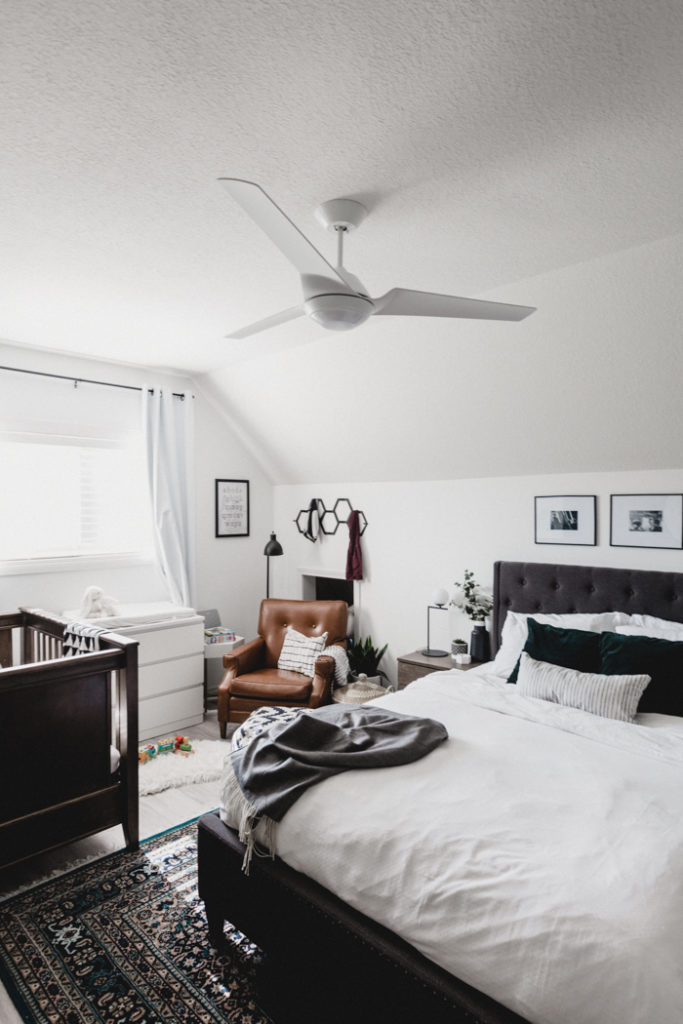 vaulted ceilings and a white fan