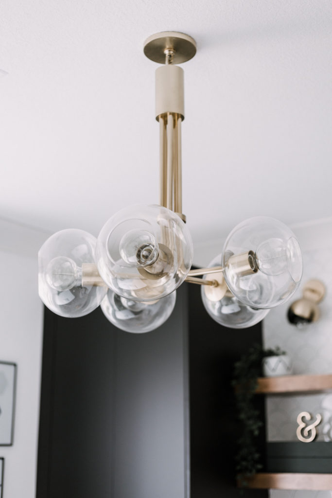 brass chandelier in home office