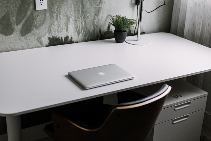 large white desk work surface in office