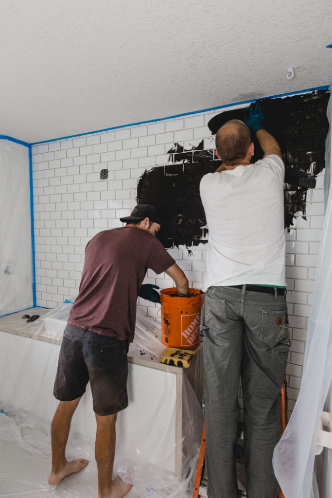 adding black grout to subway tile