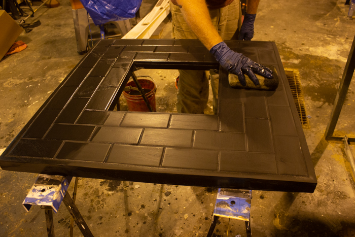 black tile with black grout on fire pit