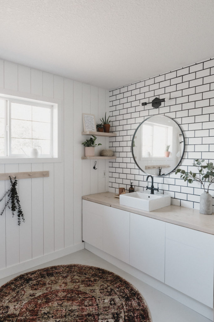 stunning bathroom with shiplap and tile wall
