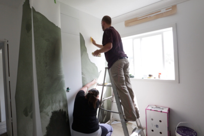 Showing how to hang a wall mural