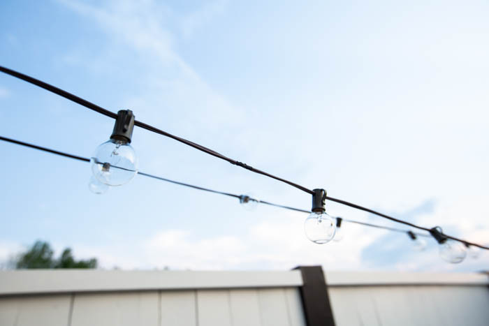 Photo showing how to hang string lights on the patio