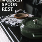 Kitchen stove with black counters and text reading "Wooden Spoon Rest"