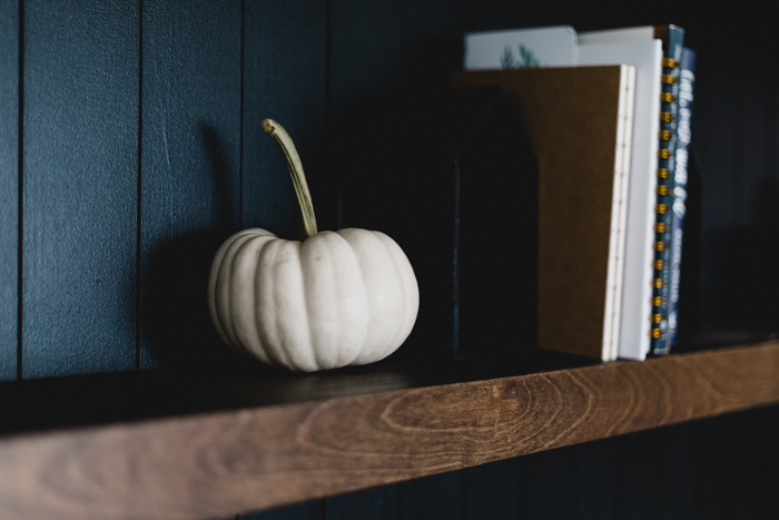white pumpkins to style shelves