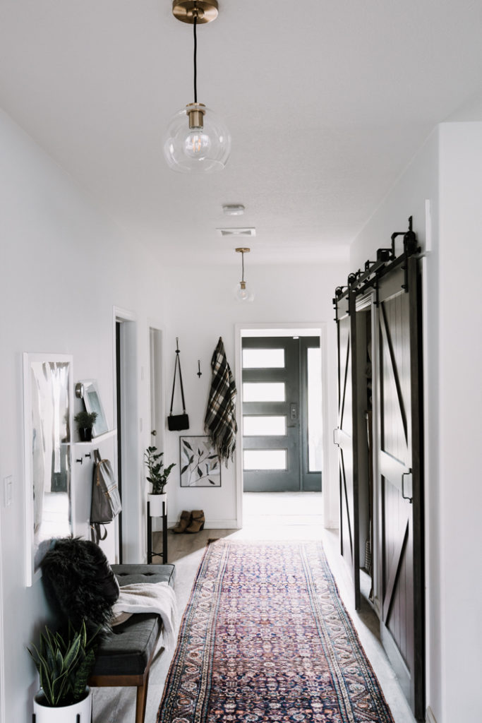 hallway with crate and barrel arren pendants