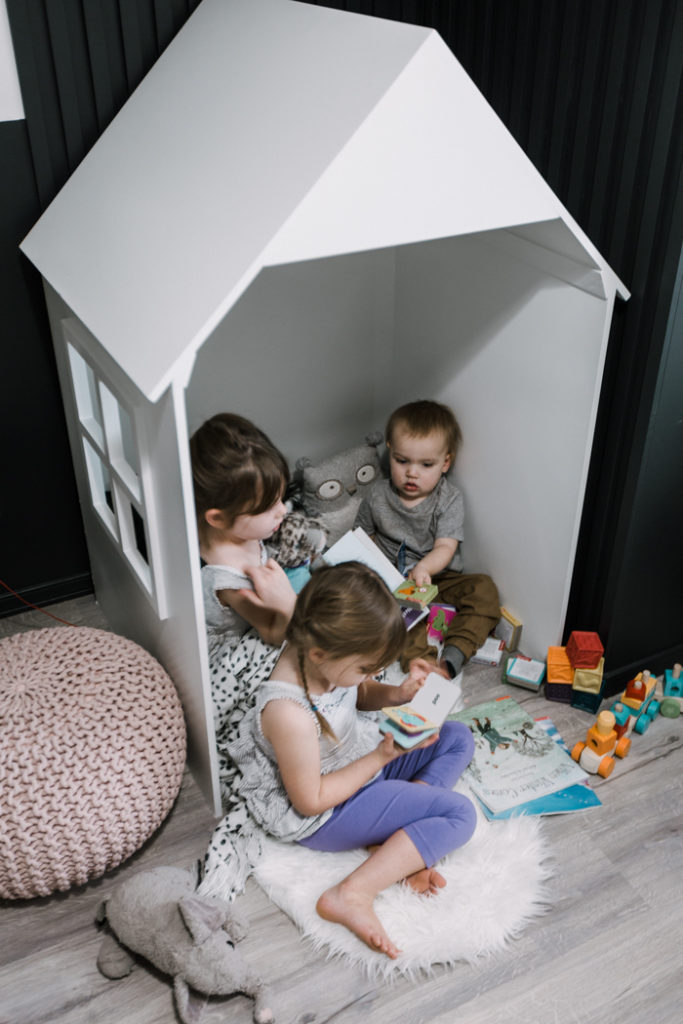 Kids in their DIY Playhouse