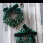 mini wreath photo with text overlay reading "DIY mini christmas wreaths"