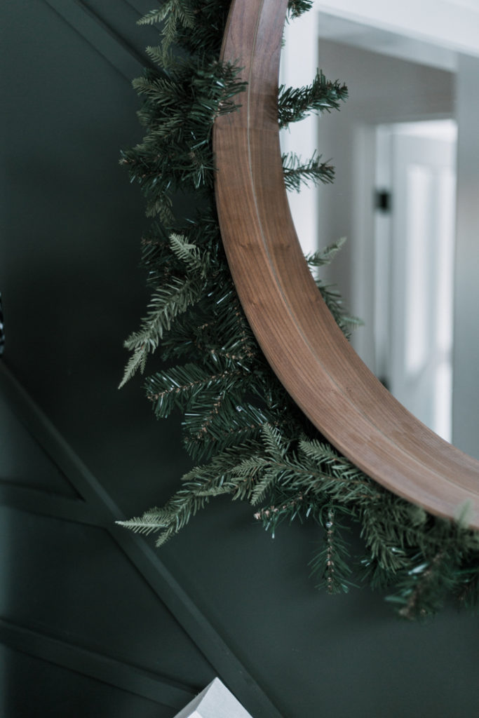 garland wrapped around a mirror