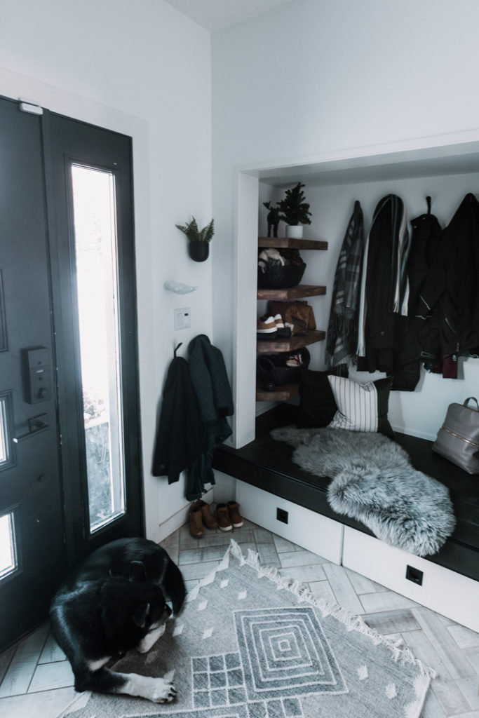 modern mudroom design with Christmas decor