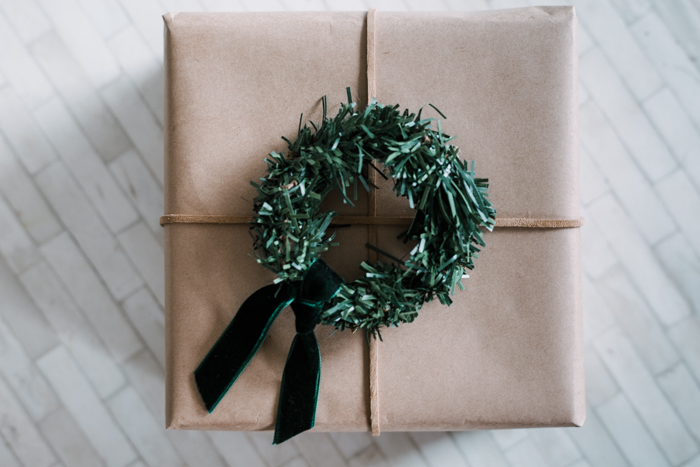 Mini wreaths on kraft paper gift