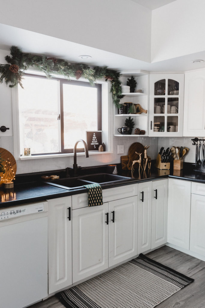 black and white kitchen with Christmas decor